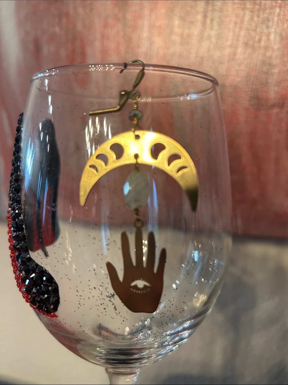 Gold Moon & Hand Dangle Earrings with Stone Accent